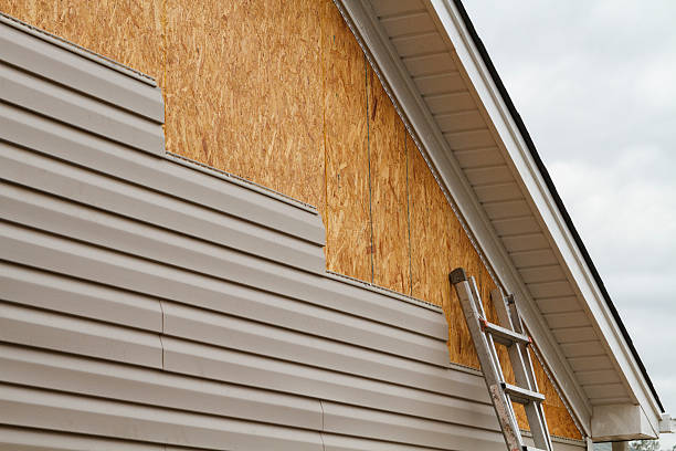 Professional Storm Damage Siding Repair technician working in Bristol, CT